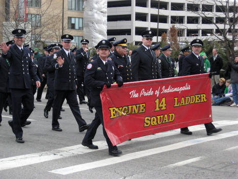 Station 14 personel marching in the Indianapolis St. Patricks Day Parade as a unit.