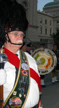 Member Clayton Thomas and the band performing at the State House.